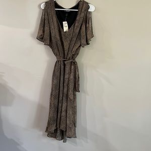 Lane Bryant Leopard print size18 never worn flown scalloped hem mid length